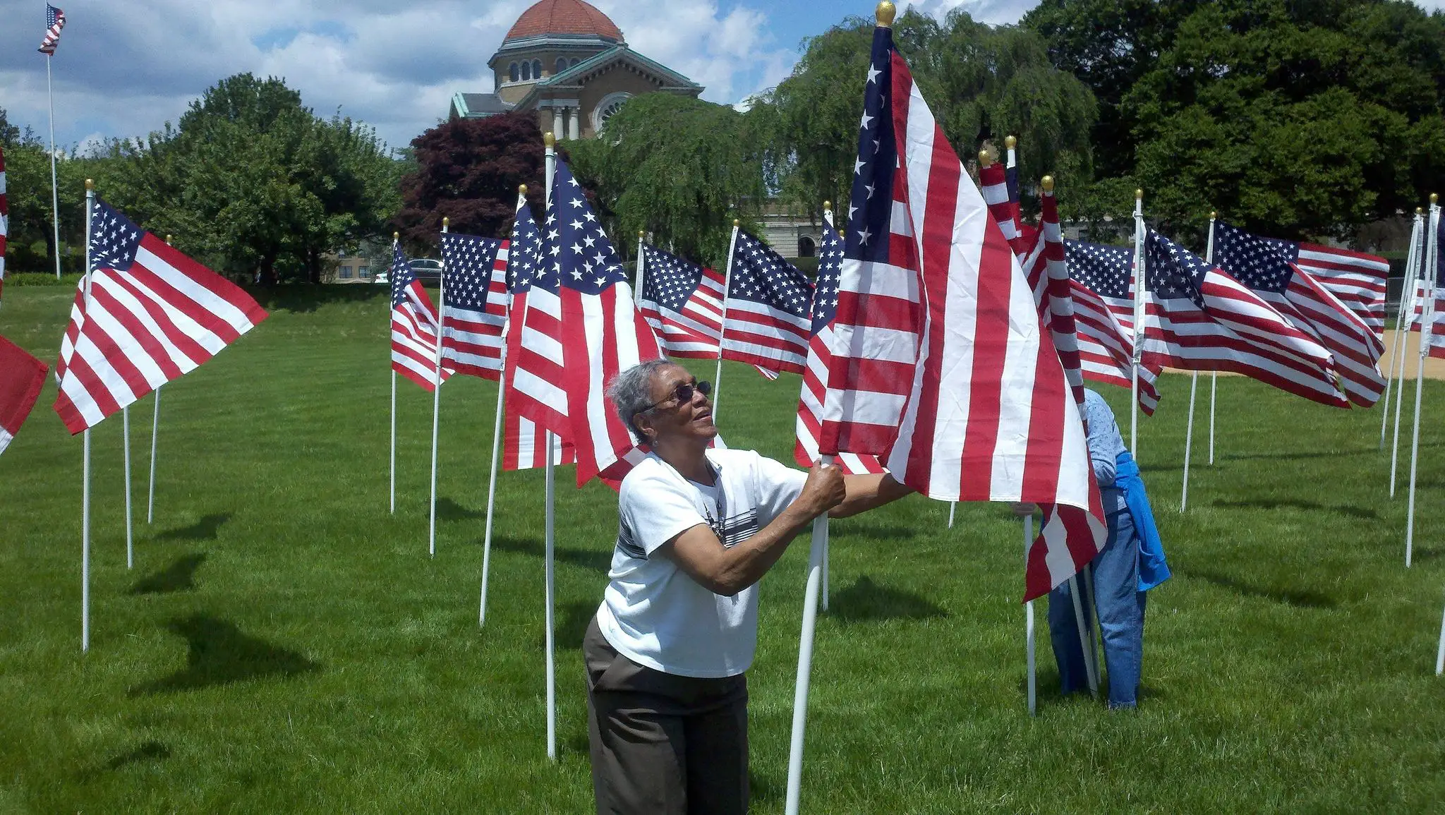 Charlestown (MD) Residents setting up display of Memorial Day flags